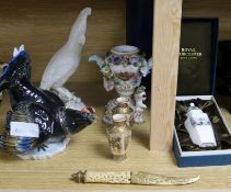 A Nymphenburg parrot, a Karl Ens grouse, a pair of Satsuma vases, etc