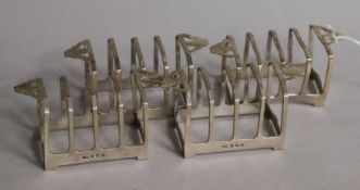 A set of four Art Deco silver five bar toast racks, Deakin & Francis Ltd, Birmingham, 1936, width