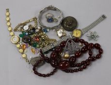 A yellow metal and aquamarine star brooch and mixed jewellery including costume and loose stones.