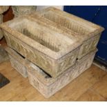 A set of four reconstituted stone rectangular planters, L 71cm