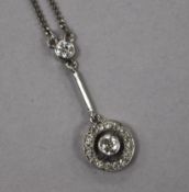 An 18ct white gold and diamond target cluster drop pendant necklace, pendant 31mm.