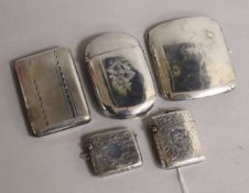 A Victorian oval silver cigarette case, Birmingham 1876, Hilliard & Thomason and four other items,