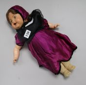 A 1940's doll and children's clothes