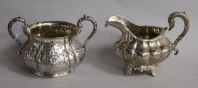 A Victorian silver two handled sugar bowl by Robert Hennell III, London, 1851 and a Victorian