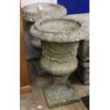 A pair of reconstituted stone campana-shaped urns, W.43cm H.66cm