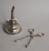 A George III Irish silver wine funnel, Dublin, 1818? and a pair of mid 18th century silver sugar