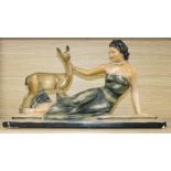 An Art Deco figure of a lady and a deer, signed, width 52cm height 28cm