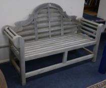 A pair of Lutyens style teak garden benches, L 168cm x W.166cm
