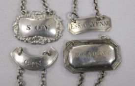 Four George III and later sauce/decanter labels; Ess:Cayenne - unmarkedSoy - William Eaton? London