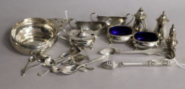 A silver quaich-style dish, various silver condiments, spoons, sugar tongs, etc.