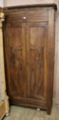 A late 19th century French walnut two door cupboard W.97cm