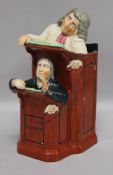 A Staffordshire figure group, 'The Preacher and Moses' height 24cm