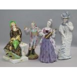 A Crown Charleston ceramic figure, 'April Showers' and three other figures, including an elegant