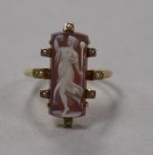 An Edwardian yellow metal, hardstone cameo and seed pearl ring with seed pearl set shoulders, size