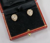 A pair of yellow metal and pear shaped diamond cluster ear studs, 12mm.