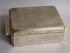 A George V Art Deco engine turned silver cigarette box, with ivory handles, James Dixon & Sons,