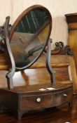 A George III inlaid mahogany bowfronted toilet mirror W.37cm