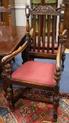 A set of 6, 17th century style oak dining chairs, (2 arm and 4 single)