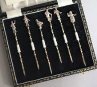 A cased set of six 1970's silver "Dickensian" cherry sticks, 93mm.