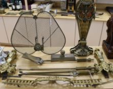 A brass and ormolu 'fan' fire screen and other items of chimney furniture