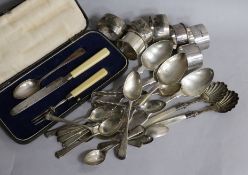 A cased matched 19th century silver christening trio, twenty ites of silver flatware and seven