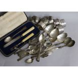 A cased matched 19th century silver christening trio, twenty ites of silver flatware and seven
