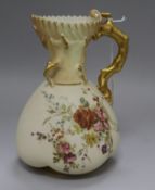 A Royal Worcester floral painted lobed jug with gilt coral handle, pattern no.1507 height 22cm