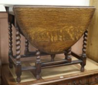 A 1920's oak barley twist gateleg table W.91cm