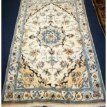 A Nain carpet 194cm x 116cm