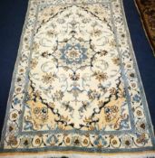 A Nain carpet 194cm x 116cm