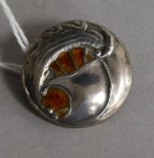 An Edwardian Art Nouveau Liberty & Co Cymric silver and enamel button, converted to a brooch,