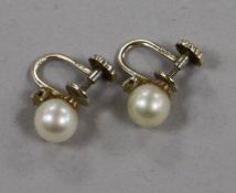 A pair of 14ct white gold, cultured pearl and gem set ear clips.
