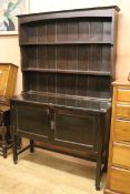 A 1920's ebonised oak dresser W.122cm