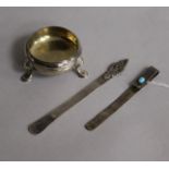 An Edwardian silver and turquoise book mark, a similar French bookmark and a Georgian silver salt.