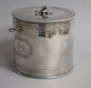 A George III engraved silver cylindrical tea caddy by Robert Jones I, London, 1774, with key,