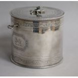 A George III engraved silver cylindrical tea caddy by Robert Jones I, London, 1774, with key,