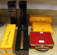 A Moet and Chandon Grand Vintage 2002 in box, two Pol Roger Champagne in boxes, two Veuve Cliquot, 4