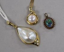 A modern 18ct gold, baroque cultured pearl and diamond pendant, a 9ct gold and cultured pearl