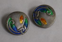 A pair of Edwardian Art Nouveau Liberty & Co Cymric silver and enamel buttons, Birmingham, 1904,