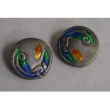 A pair of Edwardian Art Nouveau Liberty & Co Cymric silver and enamel buttons, Birmingham, 1904,