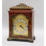 A red japanned mantel clock height 26cm width 18cm