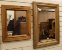 Two pine framed mirrors W. 56cm and 43cm