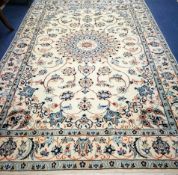 A Nain carpet 290cm. x 142cm.