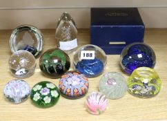 A collection of assorted glass paperweights