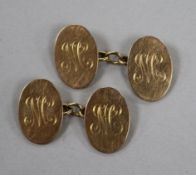 A pair of George V 9ct gold oval cufflinks.