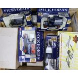 A collection of mixed corgi and matchbox cars, commercial vans etc