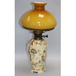 A ceramic oil lamp converted and a white glass hanging shade height 54cm incl. shade