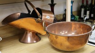 A copper coal shuttle and a two handled pot