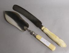 A French silver and ivory handled fish slice and a bread knife.