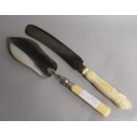 A French silver and ivory handled fish slice and a bread knife.